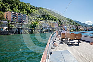 Gerra - Gambarogno, Switzerland Ã¢â¬â JUNE 24, 2015: Passengers enjoy the scenery of the Lake Maggiore